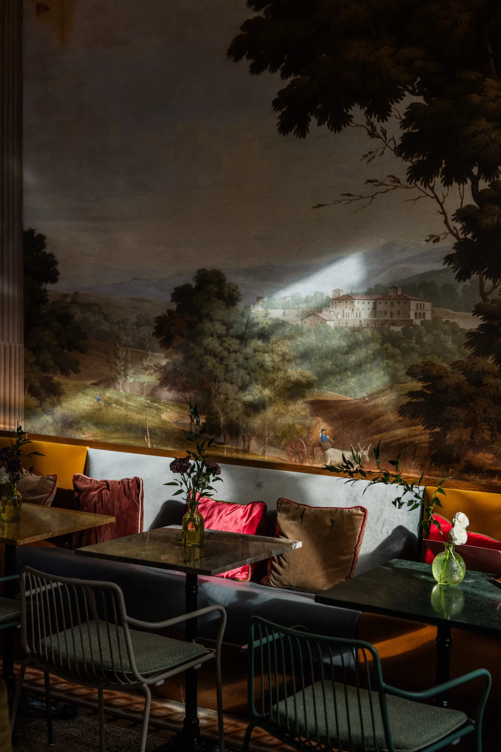 Historic boutique hotel interior at Stella d’Italia Florence with Renaissance architecture, elegant Italian design, warm textures, and atmospheric light.
