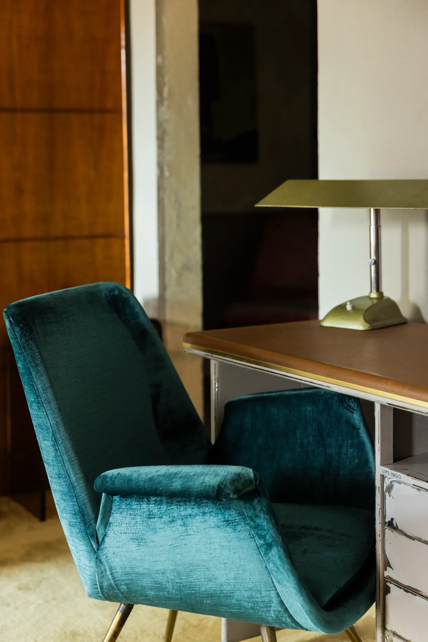 Boutique hotel interior at Oltrarno Splendid Florence featuring eclectic vintage design, layered textures, natural light, and elegant Italian atmosphere.
