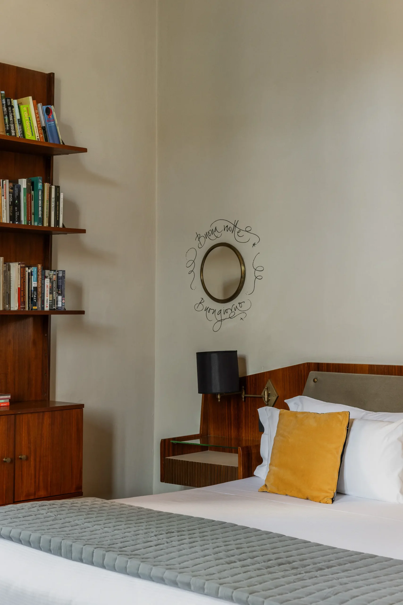 Elegant suite interior at AdAstra Florence boutique hotel overlooking the private garden, with contemporary Italian design, soft tones, and natural light.