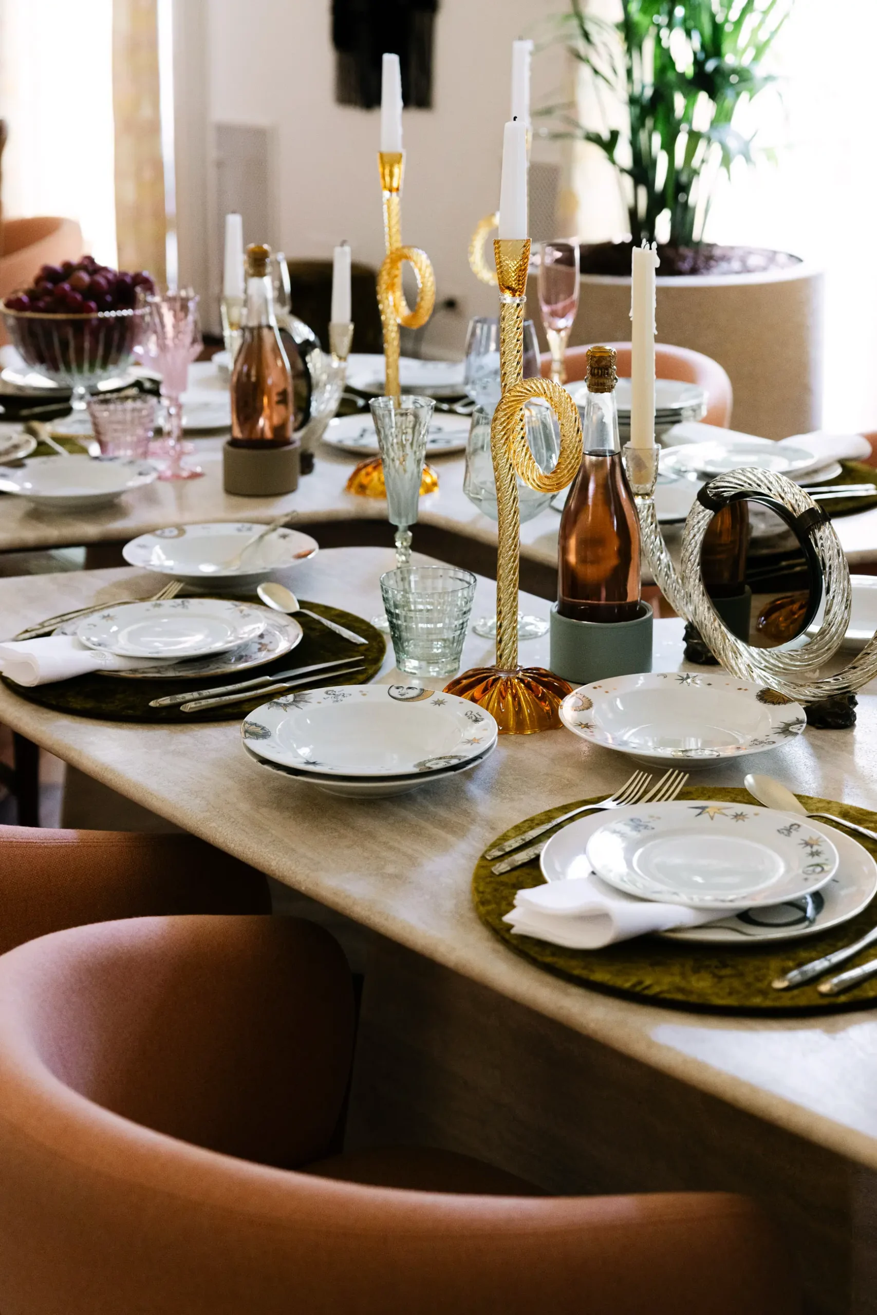Contemporary interior installation by Artemest in Milan featuring collectible Italian design, sculptural furniture, layered textures, warm tones, and atmospheric natural light.