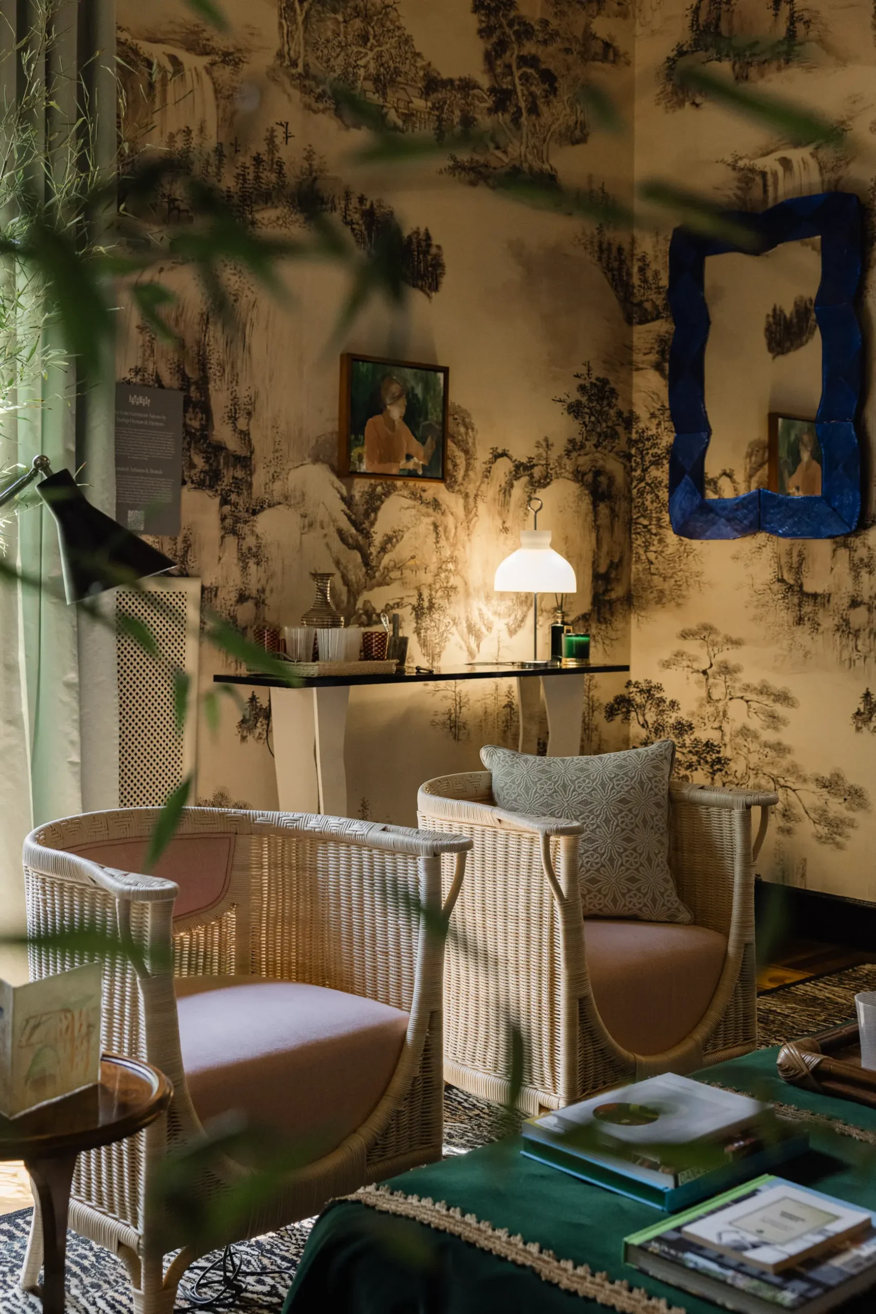 Contemporary interior installation by Artemest in Milan featuring collectible Italian design, sculptural furniture, layered textures, warm tones, and atmospheric natural light.