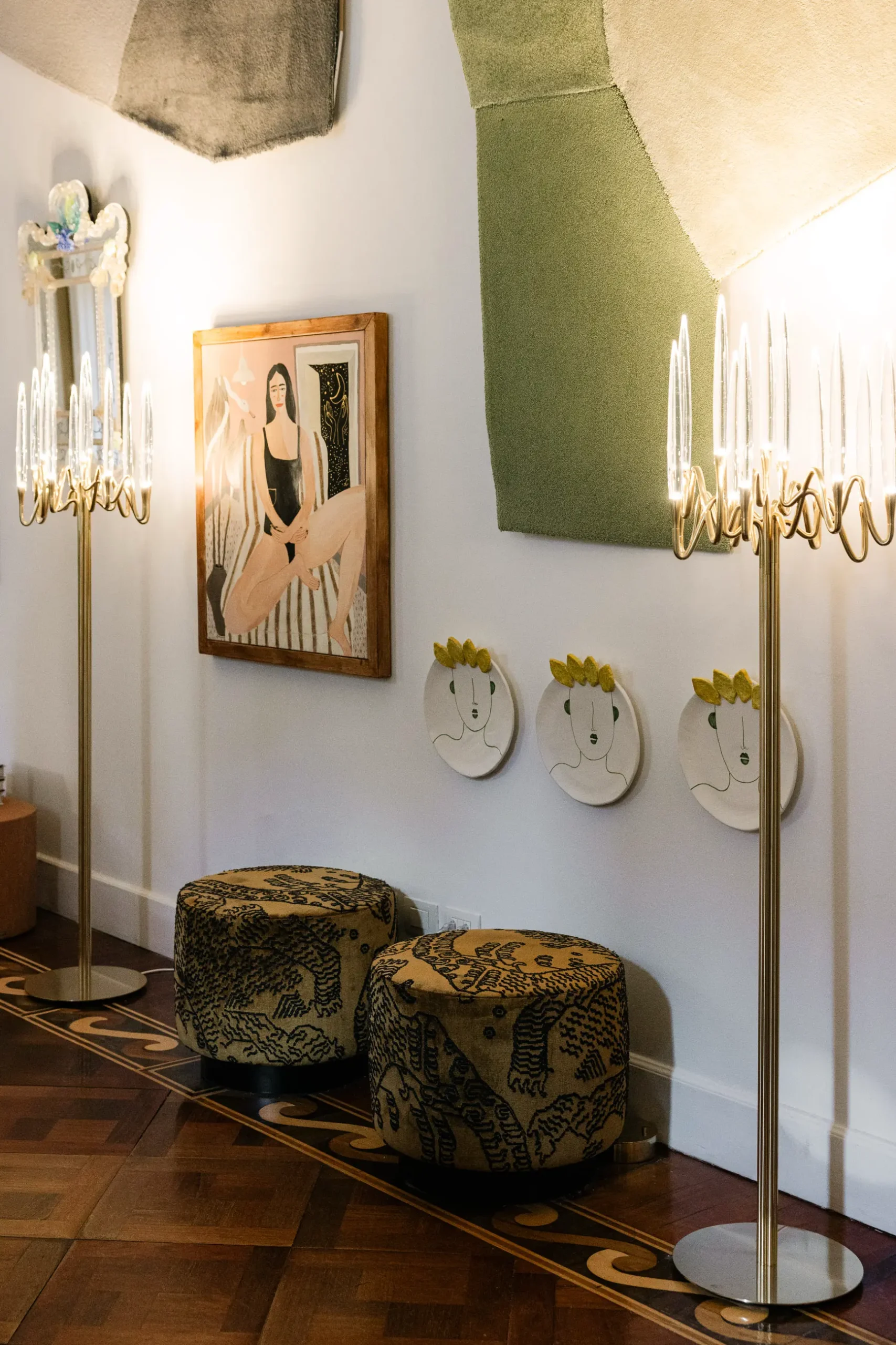Contemporary interior installation by Artemest in Milan featuring collectible Italian design, sculptural furniture, layered textures, warm tones, and atmospheric natural light.