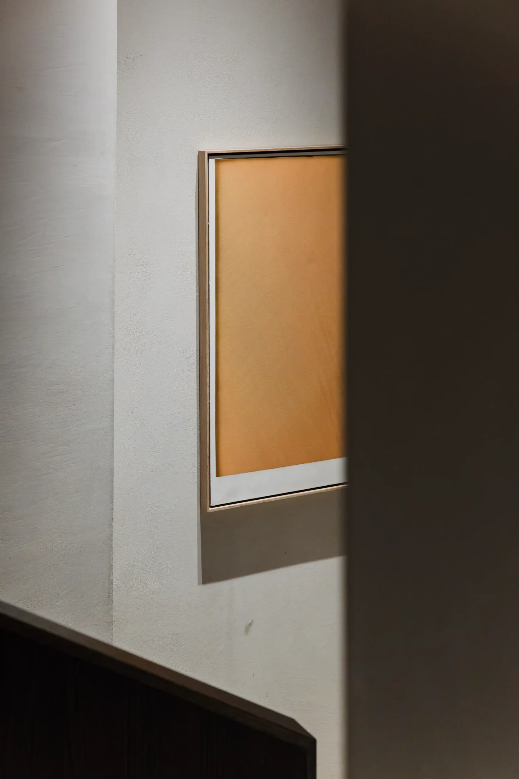 Contemporary Molteni&C interior in Milan featuring refined Italian furniture design, warm textures, sculptural forms, and elegant architectural atmosphere.